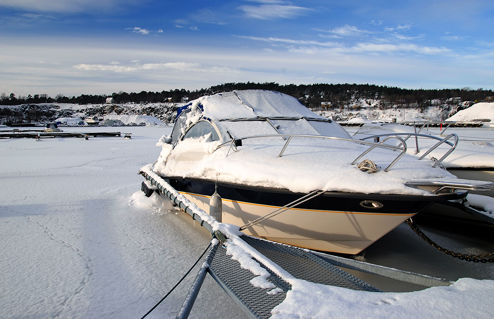 Boat covered in snow